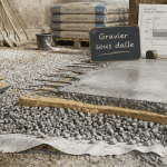 gravier sous dalle coupe chantier béton et hérisson