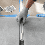 artisan pose joint dilatation carrelage